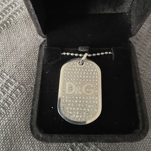 Dolce & Gabbana highly crystalized dog tag with 23” chain.